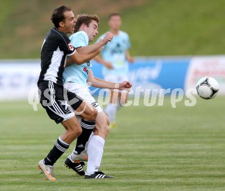 Fussball Kaerntner Liga. St. Veit gegen Gmuend. Ernst Kurt Komarek, (St. Veit), Marcel Gollmitzer  (Gmuend). St. Veit, am 26.7.2013.
Foto: Kuess
---
pressefotos, pressefotografie, kuess, qs, qspictures, sport, bild, bilder, bilddatenbank