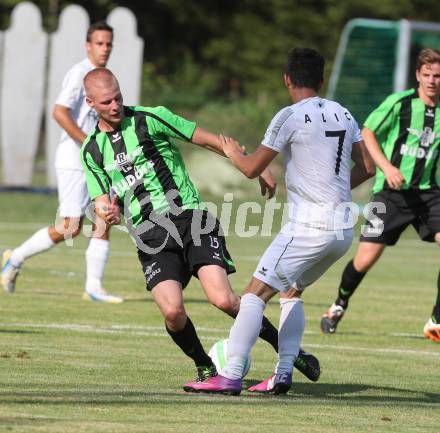 Fussball. Kaerntner Liga. ATUS Ferlach gegen Voelkermarkt.
Salih Alic (Ferlach), Matthias Maierhofer (Voelkermarkt). Ferlach, 27.7.2013.
Foto: Kuess
---
pressefotos, pressefotografie, kuess, qs, qspictures, sport, bild, bilder, bilddatenbank