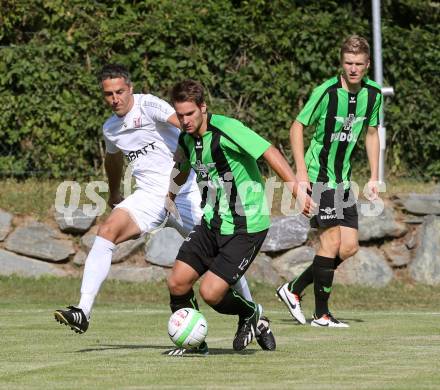 Fussball. Kaerntner Liga. ATUS Ferlach gegen Voelkermarkt.
Darko Djukic (Ferlach), Fabian Ladinig (Voelkermarkt). Ferlach, 27.7.2013.
Foto: Kuess
---
pressefotos, pressefotografie, kuess, qs, qspictures, sport, bild, bilder, bilddatenbank