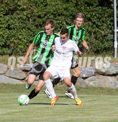 Fussball. Kaerntner Liga. ATUS Ferlach gegen Voelkermarkt.
Martin Sustersic (Ferlach), Fabian Schubert (Voelkermarkt). Ferlach, 27.7.2013.
Foto: Kuess
---
pressefotos, pressefotografie, kuess, qs, qspictures, sport, bild, bilder, bilddatenbank