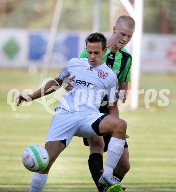 Fussball. Kaerntner Liga. ATUS Ferlach gegen Voelkermarkt.
Ernst Golautschnig (Ferlach), Matthias Maierhofer (Voelkermarkt). Ferlach, 27.7.2013.
Foto: Kuess
---
pressefotos, pressefotografie, kuess, qs, qspictures, sport, bild, bilder, bilddatenbank