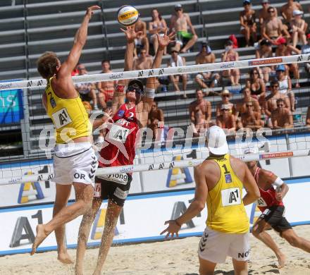 Beachvolleyball. Beach Volleyball Grand Slam 2013. Thomas KUNERT, Lorenz PETUTSCHNIG. Klagenfurt, 31.7.2013.
Foto: Kuess
---
pressefotos, pressefotografie, kuess, qs, qspictures, sport, bild, bilder, bilddatenbank