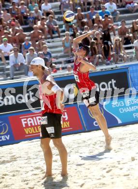 Beachvolleyball. Beach Volleyball Grand Slam 2013. Thomas KUNERT, Lorenz PETUTSCHNIG. Klagenfurt, 31.7.2013.
Foto: Kuess
---
pressefotos, pressefotografie, kuess, qs, qspictures, sport, bild, bilder, bilddatenbank