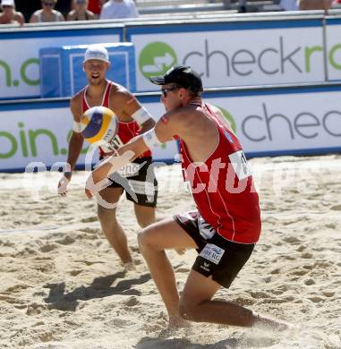 Beachvolleyball. Beach Volleyball Grand Slam 2013. Thomas KUNERT, Lorenz PETUTSCHNIG. Klagenfurt, 31.7.2013.
Foto: Kuess
---
pressefotos, pressefotografie, kuess, qs, qspictures, sport, bild, bilder, bilddatenbank