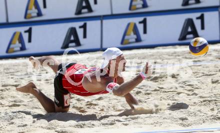 Beachvolleyball. Beach Volleyball Grand Slam 2013. Thomas KUNERT. Klagenfurt, 31.7.2013.
Foto: Kuess
---
pressefotos, pressefotografie, kuess, qs, qspictures, sport, bild, bilder, bilddatenbank