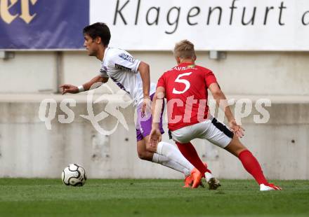 Fussball. Regionalliga. SAK gegen SK Austria Klagenfurt gegen St. Florian. Noel Alonso Perez (Austria Klagenfurt), Thomas  Jackel (St. Florian). Klagenfurt, 9.6.2013.
Foto: Kuess
---
pressefotos, pressefotografie, kuess, qs, qspictures, sport, bild, bilder, bilddatenbank