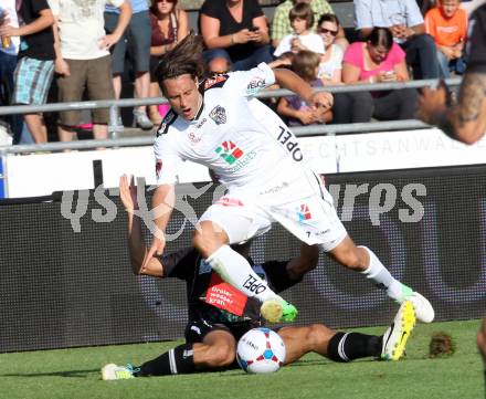 Fussball Bundesliga. RZ Pellets WAC gegen FC Wacker Innsbruck. Dario Baldauf,  (WAC), Alexander Hauser (Innsbruck). Wolfsberg, 10.8.2013.
Foto: Kuess

---
pressefotos, pressefotografie, kuess, qs, qspictures, sport, bild, bilder, bilddatenbank