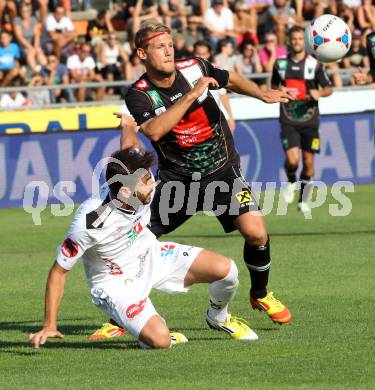 Fussball Bundesliga. RZ Pellets WAC gegen FC Wacker Innsbruck. Daniel Lucas Segovia,  (WAC),  Sebastian Siller (Innsbruck). Wolfsberg, 10.8.2013.
Foto: Kuess

---
pressefotos, pressefotografie, kuess, qs, qspictures, sport, bild, bilder, bilddatenbank