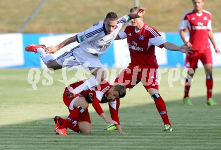 Fussball Testspiel. Hamburger SV gegen RSC Anderlecht. Ivo Ilicevic,  (HSV), Massimo Bruno (Anderlecht). St. Veit, am 15.7.2013.
Foto: Kuess
---
pressefotos, pressefotografie, kuess, qs, qspictures, sport, bild, bilder, bilddatenbank