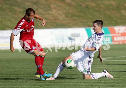 Fussball Testspiel. Hamburger SV gegen RSC Anderlecht. Rafael Van der Vaart, (HSV),Sacha Kljestan  (Anderlecht). St. Veit, am 15.7.2013.
Foto: Kuess
---
pressefotos, pressefotografie, kuess, qs, qspictures, sport, bild, bilder, bilddatenbank