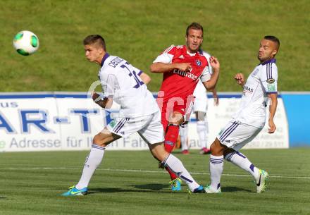 Fussball Testspiel. Hamburger SV gegen RSC Anderlecht. Rafael Van der Vaart,  (HSV), Leander Dendocker, Demy De Zeeuw (Anderlecht). St. Veit, am 15.7.2013.
Foto: Kuess
---
pressefotos, pressefotografie, kuess, qs, qspictures, sport, bild, bilder, bilddatenbank