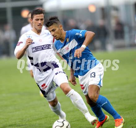 Fussball. Regionalliga. SAK gegen VSV. Darjan Aleksic (SAK), Sandro Michael Ebner (VSV).. Klagenfurt, 20.8.2013.
Foto: Kuess
---
pressefotos, pressefotografie, kuess, qs, qspictures, sport, bild, bilder, bilddatenbank