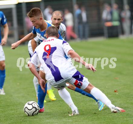 Fussball. Regionalliga. SAK gegen VSV. Grega Triplat (SAK), Michael Ramusch (VSV). Klagenfurt, 20.8.2013.
Foto: Kuess
---
pressefotos, pressefotografie, kuess, qs, qspictures, sport, bild, bilder, bilddatenbank