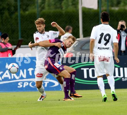 Fussball Bundesliga. RZ Pellets WAC gegen FK Austria Wien. Boris Huettenbrenner,  (WAC), Alexander Gruenwald (Wien). Wolfsberg, 24.8.2013.
Foto: Kuess

---
pressefotos, pressefotografie, kuess, qs, qspictures, sport, bild, bilder, bilddatenbank