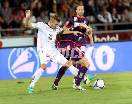 Fussball Bundesliga. RZ Pellets WAC gegen FK Austria Wien. Manuel Kerhe, (WAC), Holland James  (Austria Wien). Wolfsberg, 24.8.2013.
Foto: Kuess

---
pressefotos, pressefotografie, kuess, qs, qspictures, sport, bild, bilder, bilddatenbank