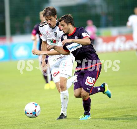 Fussball Bundesliga. RZ Pellets WAC gegen FK Austria Wien. Christian Falk,  (WAC), Markus Suttner (Austria Wien). Wolfsberg, 24.8.2013.
Foto: Kuess

---
pressefotos, pressefotografie, kuess, qs, qspictures, sport, bild, bilder, bilddatenbank