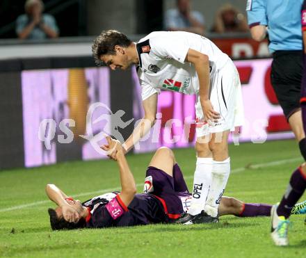 Fussball Bundesliga. RZ Pellets WAC gegen FK Austria Wien.  Christian Falk,  (WAC), Markus Suttner (Austria Wien). Wolfsberg, 24.8.2013.
Foto: Kuess

---
pressefotos, pressefotografie, kuess, qs, qspictures, sport, bild, bilder, bilddatenbank