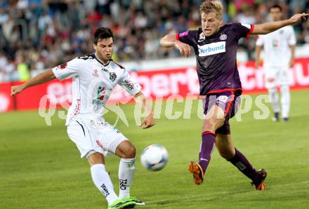 Fussball Bundesliga. RZ Pellets WAC gegen FK Austria Wien. Roland Putsche,  (WAC), Alexander Gruenwald (Austria Wien). Wolfsberg, 24.8.2013.
Foto: Kuess

---
pressefotos, pressefotografie, kuess, qs, qspictures, sport, bild, bilder, bilddatenbank