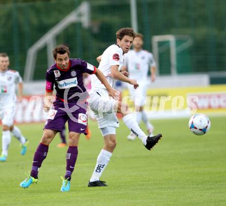 Fussball Bundesliga. RZ Pellets WAC gegen FK Austria Wien.  Christian Falk (WAC), Markus Suttner (Austria Wien). Wolfsberg, 24.8.2013.
Foto: Kuess

---
pressefotos, pressefotografie, kuess, qs, qspictures, sport, bild, bilder, bilddatenbank