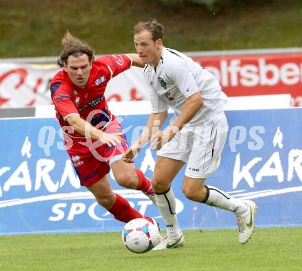 Fussball Regionalliga. WAC Amateure gegen SAK. Mario Kroepfl,  (WAC), Andrej Pecnik (SAK). Wolfsberg, am 25.8.2013.
Foto: Kuess
---
pressefotos, pressefotografie, kuess, qs, qspictures, sport, bild, bilder, bilddatenbank