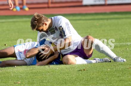 Fussball Regionalliga. VSV gegen SK Austria Klagenfurt. Dejan Kecanovic, (VSV), Peter Pucker  (Austria Klagenfurt). Villach, 24.8.2013.
Foto: Kuess
---
pressefotos, pressefotografie, kuess, qs, qspictures, sport, bild, bilder, bilddatenbank