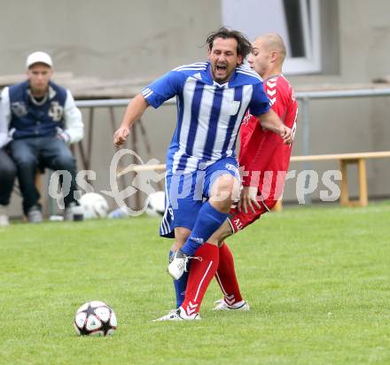 Fussball 1. Klasse D. Gallizien gegen Rueckersdorf. Paul Kral (Gallizien), Mario Ivkic (Rueckersdorf). Gallizien, am 25.8.2013.
Foto: Kuess
---
pressefotos, pressefotografie, kuess, qs, qspictures, sport, bild, bilder, bilddatenbank