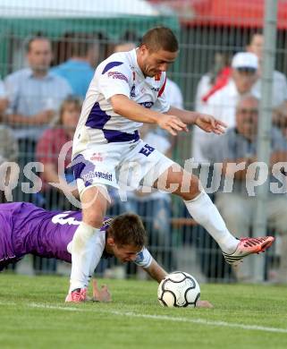 Fussball Regionalliga. SAK gegen SK Austria Klagenfurt. Grega Triplat,  (SAK), Patrik Eler (Austria Klagenfurt). Klagenfurt, 6.9.2013.
Foto: Kuess
---
pressefotos, pressefotografie, kuess, qs, qspictures, sport, bild, bilder, bilddatenbank