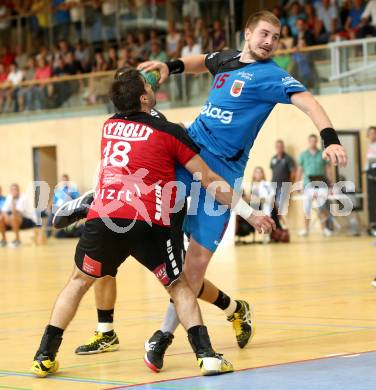 HLA. Handball Bundesliga. SC Ferlach gegen Sparkasse Schwaz.  Fabian Posch (Ferlach), Perovic Draguljub (Schwaz). Ferlach, 7.9.2013.
Foto: Kuess
---
pressefotos, pressefotografie, kuess, qs, qspictures, sport, bild, bilder, bilddatenbank