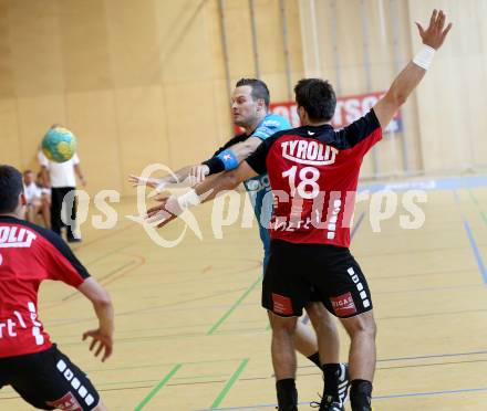 HLA. Handball Bundesliga. SC Ferlach gegen Sparkasse Schwaz. Patrick Jochum  (Ferlach), Perovic Draguljub (Schwaz). Ferlach, 7.9.2013.
Foto: Kuess
---
pressefotos, pressefotografie, kuess, qs, qspictures, sport, bild, bilder, bilddatenbank