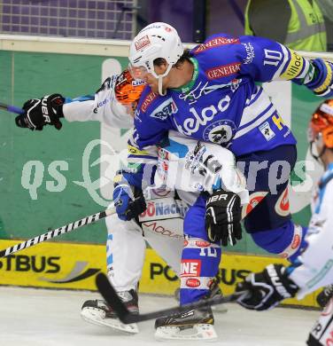 EBEL. Eishockey Bundesliga. EC VSV gegen EHC LIWEST Linz.. Brock McBride, (VSV),  Rob Hisey (EHC LIWEST Linz). Villach, am 13.9.2013.
Foto: Kuess 


---
pressefotos, pressefotografie, kuess, qs, qspictures, sport, bild, bilder, bilddatenbank