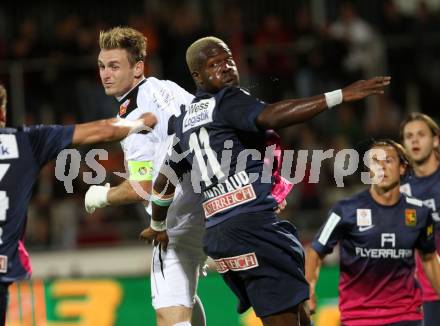 Fussball Bundesliga. RZ Pellets WAC gegen FC Admira Wacker Moedling. Michael Sollbauer, (WAC),  Wilfried Omoraud (Moedling). Wolfsberg, 14.9.2013.
Foto: Kuess

---
pressefotos, pressefotografie, kuess, qs, qspictures, sport, bild, bilder, bilddatenbank