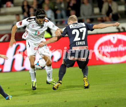 Fussball Bundesliga. RZ Pellets WAC gegen FC Admira Wacker Moedling. Jacobo Ynclan Pajares, (WAC), Thomas Ebner (Moedling). Wolfsberg, 14.9.2013.
Foto: Kuess

---
pressefotos, pressefotografie, kuess, qs, qspictures, sport, bild, bilder, bilddatenbank