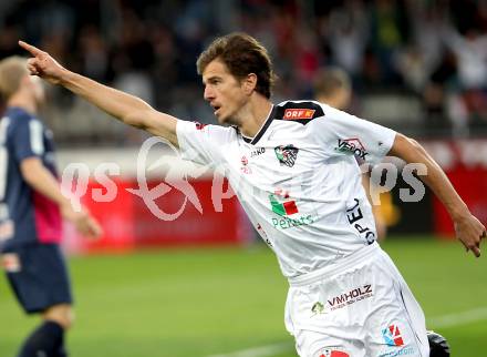 Fussball Bundesliga. RZ Pellets WAC gegen FC Admira Wacker Moedling. Torjubel Christian Falk  (WAC). Wolfsberg, 14.9.2013.
Foto: Kuess

---
pressefotos, pressefotografie, kuess, qs, qspictures, sport, bild, bilder, bilddatenbank