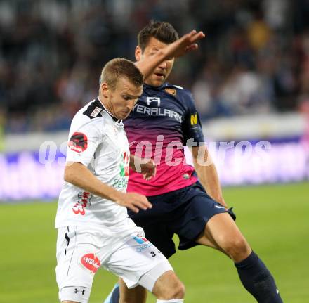 Fussball Bundesliga. RZ Pellets WAC gegen FC Admira Wacker Moedling. Manuel Kerhe, (WAC), Markus Katzer (Moedling).. Wolfsberg, 14.9.2013.
Foto: Kuess

---
pressefotos, pressefotografie, kuess, qs, qspictures, sport, bild, bilder, bilddatenbank