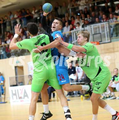 HLA. Handball. SC Ferlach gegen SG INSIGNIS HANDBALL WESTWIEN. Mladan Jovanovic,  (Ferlach), Wilhelm Jelinek (Westwien).. Ferlach, am 14.9.2013.
Foto: Kuess 
---
pressefotos, pressefotografie, kuess, qs, qspictures, sport, bild, bilder, bilddatenbank