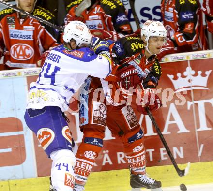 EBEL. Eishockey Bundesliga. KAC gegen VSV. John Lammers, (KAC),  Curtis Fraser  (VSV). Klagenfurt, am 15.9.2013
Foto: Kuess 

---
pressefotos, pressefotografie, kuess, qs, qspictures, sport, bild, bilder, bilddatenbank