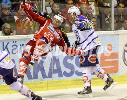 EBEL. Eishockey Bundesliga. KAC gegen VSV.  David Schuller, (KAC), Benjamin Petrik  (VSV). Klagenfurt, am 15.9.2013
Foto: Kuess 

---
pressefotos, pressefotografie, kuess, qs, qspictures, sport, bild, bilder, bilddatenbank