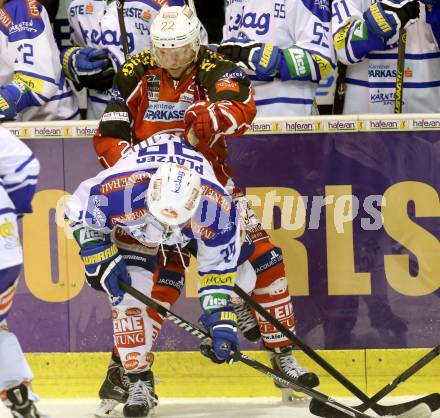 EBEL. Eishockey Bundesliga. KAC gegen VSV. Thomas Poeck, (KAC), Patrick Platzer  (VSV). Klagenfurt, am 15.9.2013
Foto: Kuess 

---
pressefotos, pressefotografie, kuess, qs, qspictures, sport, bild, bilder, bilddatenbank