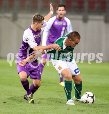 Fussball. Regionalliga. SK Austria Klagenfurt gegen Wallern. Kevin Winkler (Austria Klagenfurt),  Lukas Grgic (Wallern). Klagenfurt, 20.9.2013.
Foto: Kuess
---
pressefotos, pressefotografie, kuess, qs, qspictures, sport, bild, bilder, bilddatenbank