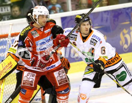 EBEL. Eishockey Bundesliga. KAC gegen Moser Medical Graz 99ers.  John Lammers, (KAC), Stefan Lassen  (Graz). Klagenfurt, am 22.9.2013
Foto: Kuess 

---
pressefotos, pressefotografie, kuess, qs, qspictures, sport, bild, bilder, bilddatenbank