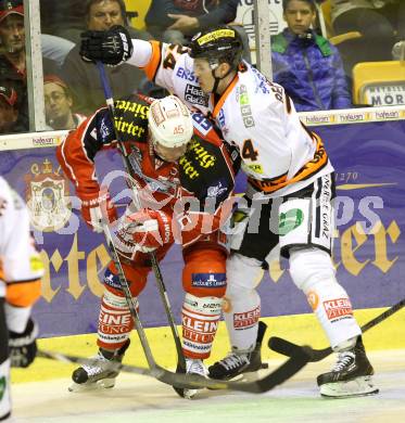 EBEL. Eishockey Bundesliga. KAC gegen Moser Medical Graz 99ers.  David Schuller, (KAC), Kristof Reinthaler  (Graz). Klagenfurt, am 22.9.2013
Foto: Kuess 

---
pressefotos, pressefotografie, kuess, qs, qspictures, sport, bild, bilder, bilddatenbank