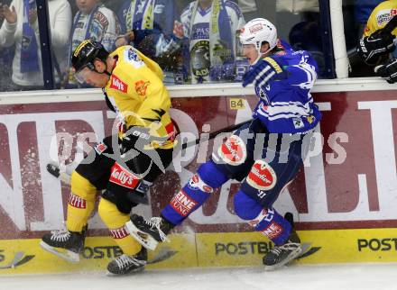 EBEL. Eishockey Bundesliga. EC VSV gegen UPC Vienna Capitals.  Adis Alagic, (VSV), Jamie Fraser  (Vienna). Villach, am 22.9.2013.
Foto: Kuess 


---
pressefotos, pressefotografie, kuess, qs, qspictures, sport, bild, bilder, bilddatenbank