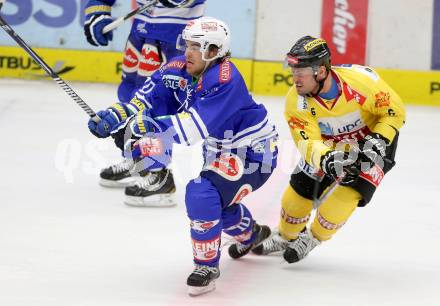 EBEL. Eishockey Bundesliga. EC VSV gegen UPC Vienna Capitals. Brock McBride, (VSV), Raffael Rotter  (Vienna). Villach, am 22.9.2013.
Foto: Kuess 


---
pressefotos, pressefotografie, kuess, qs, qspictures, sport, bild, bilder, bilddatenbank