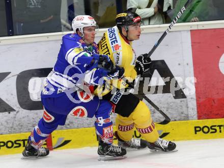 EBEL. Eishockey Bundesliga. EC VSV gegen UPC Vienna Capitals. Alexander Rauchenwald, (VSV), Mike Ouellette  (Vienna). Villach, am 22.9.2013.
Foto: Kuess 


---
pressefotos, pressefotografie, kuess, qs, qspictures, sport, bild, bilder, bilddatenbank