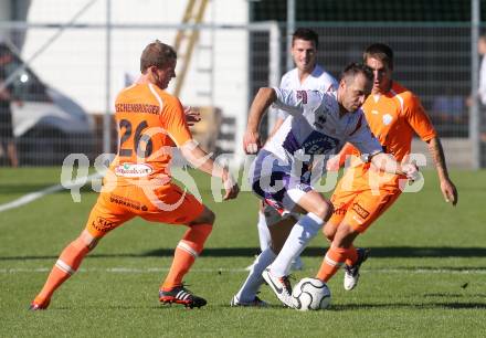 Fussball OEFB Cup. SAK gegen Hartberg. Goran Jolic, (SAK), Jan Zwischenbrugger  (Hartberg). Klagenfurt, 23.9.2013.
Foto: Kuess
---
pressefotos, pressefotografie, kuess, qs, qspictures, sport, bild, bilder, bilddatenbank