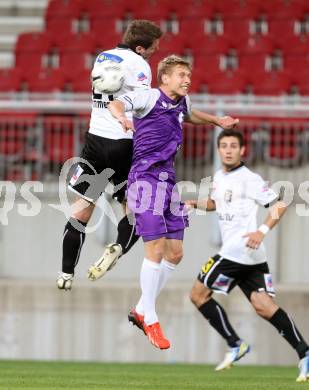 Fussball OEFB Cup. SK Austria Klagenfurt gegen Parndorf. David Poljanec, (Austria Klagenfurt), Roman Kummerer  (Parndorf). Klagenfurt, 24.9.2013.
Foto: Kuess
---
pressefotos, pressefotografie, kuess, qs, qspictures, sport, bild, bilder, bilddatenbank