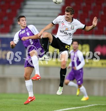 Fussball OEFB Cup. SK Austria Klagenfurt gegen Parndorf. Marko Rojc, (Austria Klagenfurt), Sebastian Wimmer  (Parndorf). Klagenfurt, 24.9.2013.
Foto: Kuess
---
pressefotos, pressefotografie, kuess, qs, qspictures, sport, bild, bilder, bilddatenbank