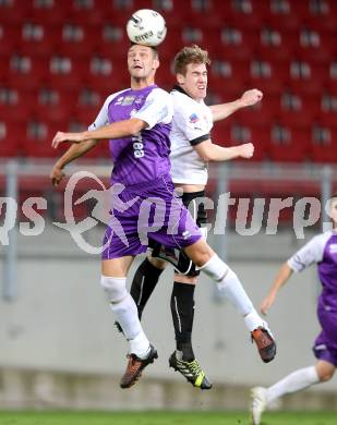 Fussball OEFB Cup. SK Austria Klagenfurt gegen Parndorf. Sasa Lalovic, (Austria Klagenfurt),  Patrick Baumeister  (Parndorf). Klagenfurt, 24.9.2013.
Foto: Kuess
---
pressefotos, pressefotografie, kuess, qs, qspictures, sport, bild, bilder, bilddatenbank