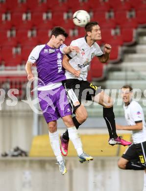 Fussball OEFB Cup. SK Austria Klagenfurt gegen Parndorf. Andreas Tiffner, (Austria Klagenfurt), Tomas Horvath (Parndorf). Klagenfurt, 24.9.2013.
Foto: Kuess
---
pressefotos, pressefotografie, kuess, qs, qspictures, sport, bild, bilder, bilddatenbank