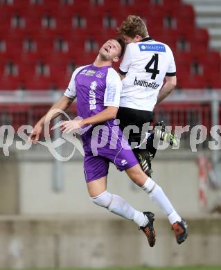 Fussball OEFB Cup. SK Austria Klagenfurt gegen Parndorf. Sasa Lalovic,  (Austria Klagenfurt), Patrick Baumeister (Parndorf). Klagenfurt, 24.9.2013.
Foto: Kuess
---
pressefotos, pressefotografie, kuess, qs, qspictures, sport, bild, bilder, bilddatenbank